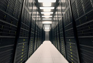 View down data center corridor with banks of servers on each side